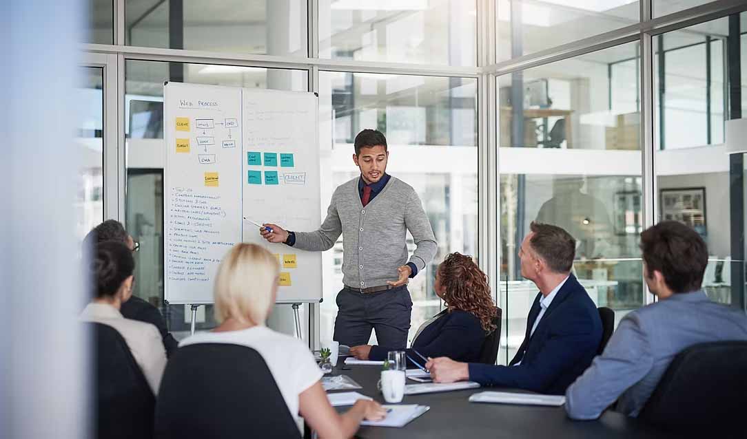 Business consultant presenting a strategy roadmap to a corporate team